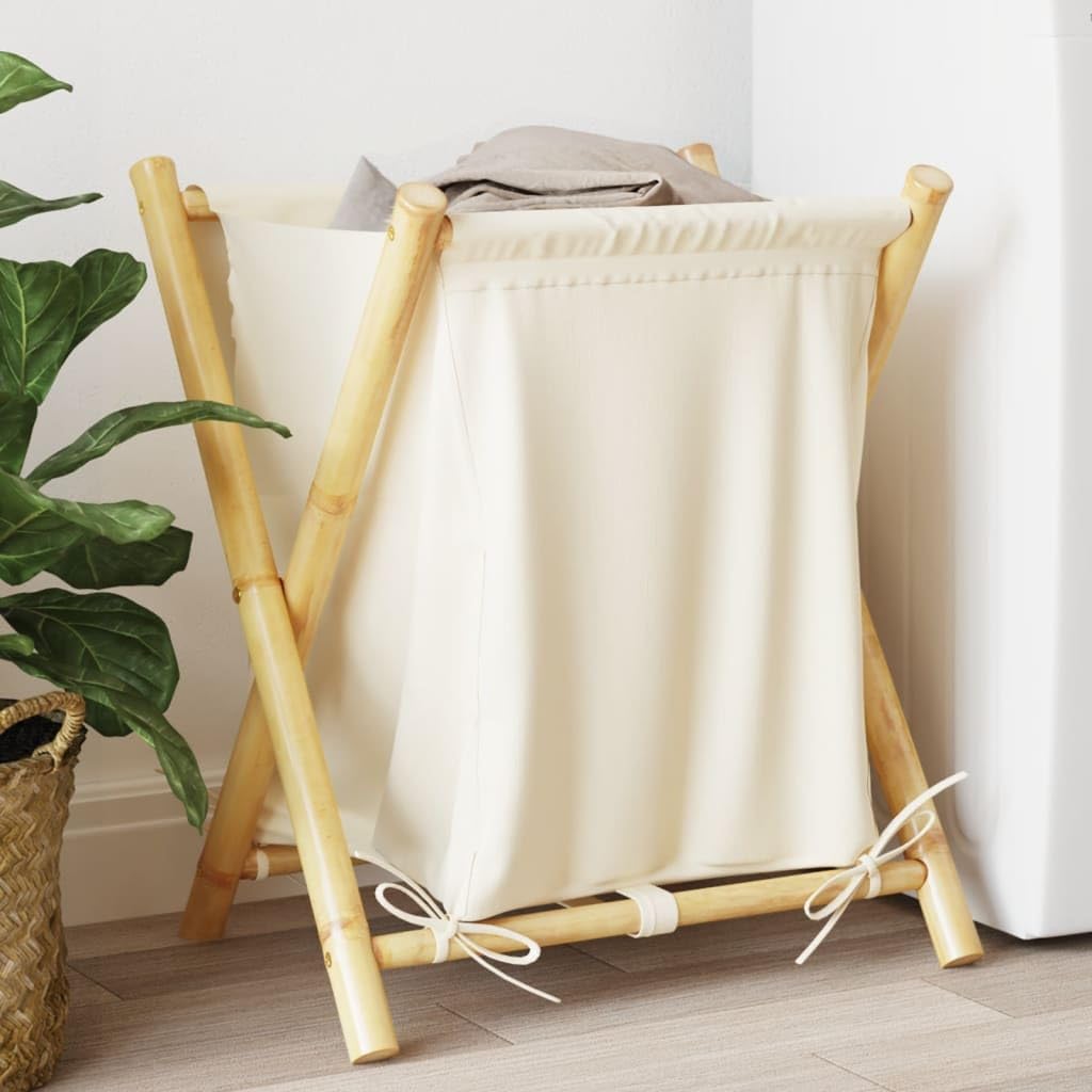 Ce panier a linge se presente en coloris blanc